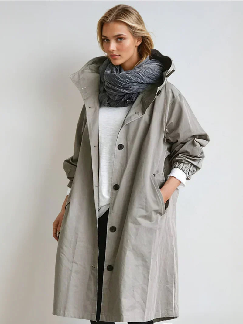 Imperméable femme avec capuche et ceinture – manteau de pluie élégant