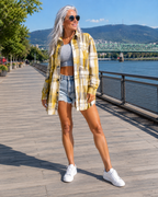 Chemise longue femme à carreaux avec poches et boutons