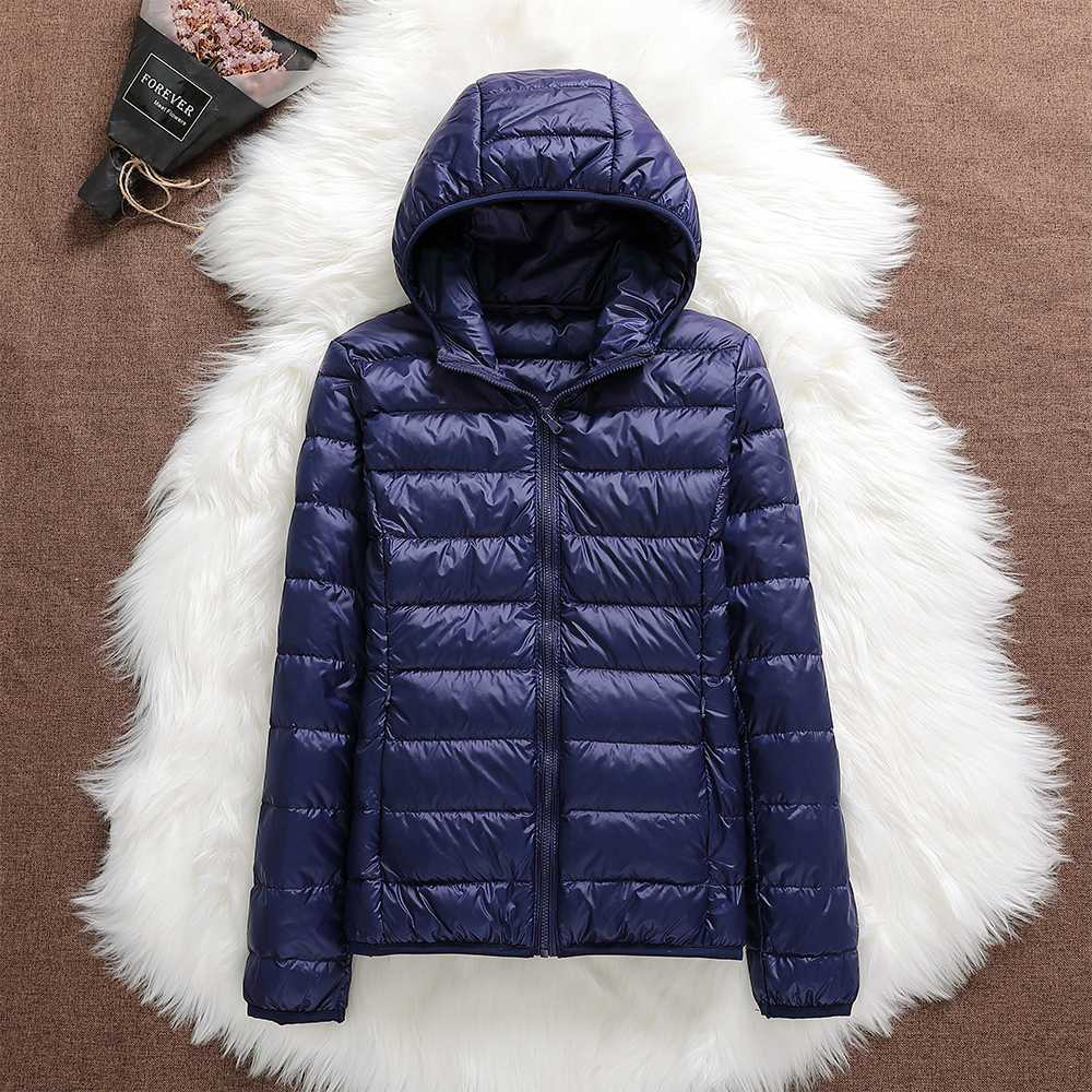 Doudoune légère femme à capuche – veste matelassée compacte pour mi-saison et hiver