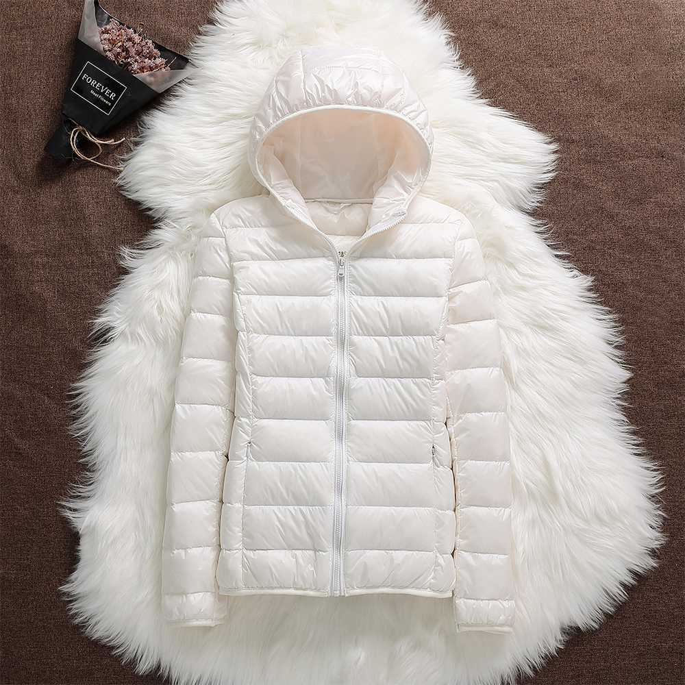 Doudoune légère femme à capuche – veste matelassée compacte pour mi-saison et hiver