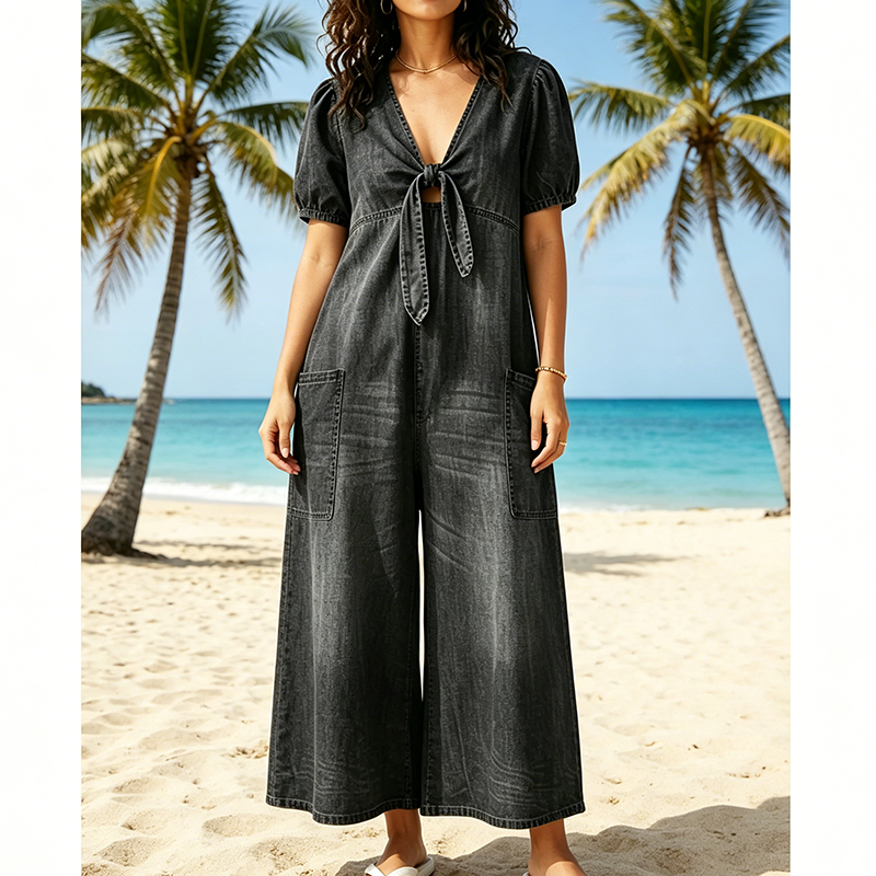 Combinaison femme à col V noué et jambes larges fluides