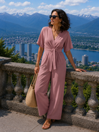 Combinaison femme élégante à jambes larges avec ceinture nouée